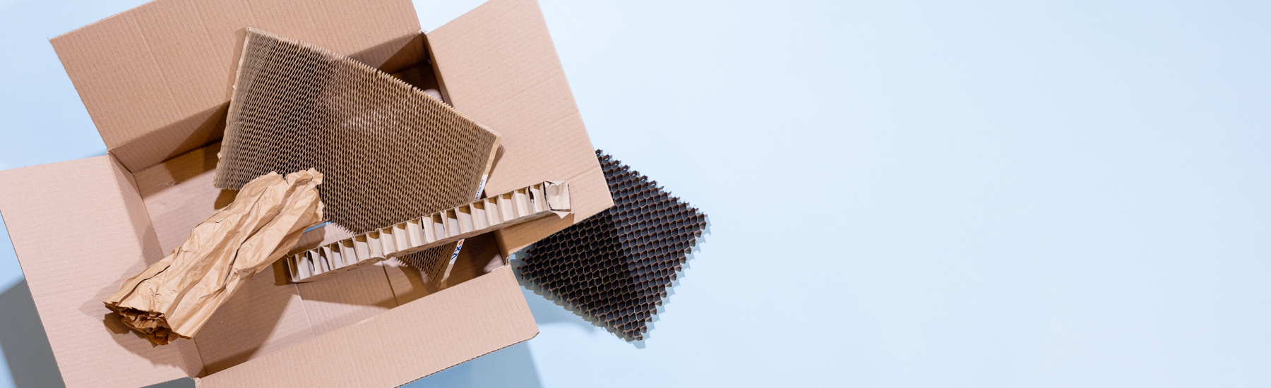 Stacked corrugated containerboard sheets